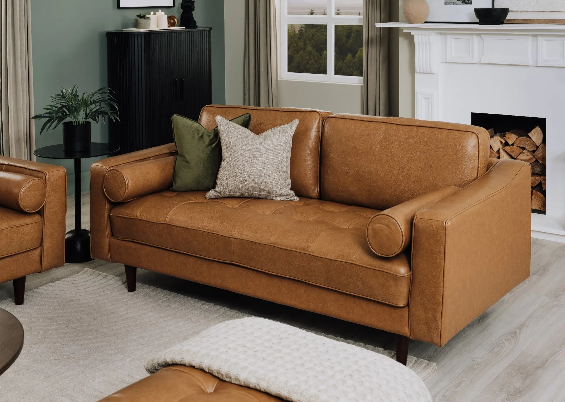 A lifestyle image of the Genoa 2.5 seater sofa with Nola cabinet.