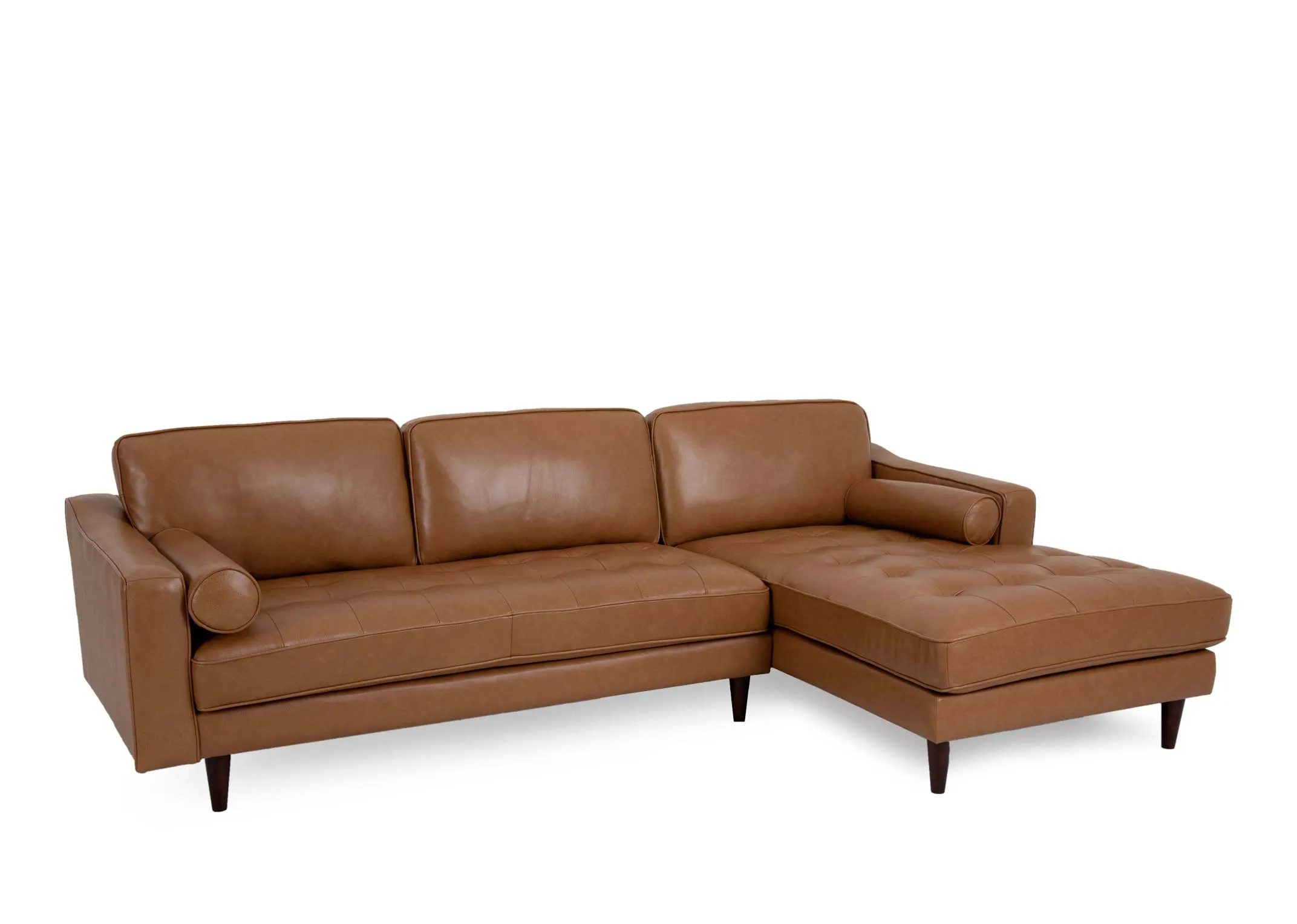 A RHF tan leather corner chaise from EZ Livings Genoa range. Angled view of bolster cushions.