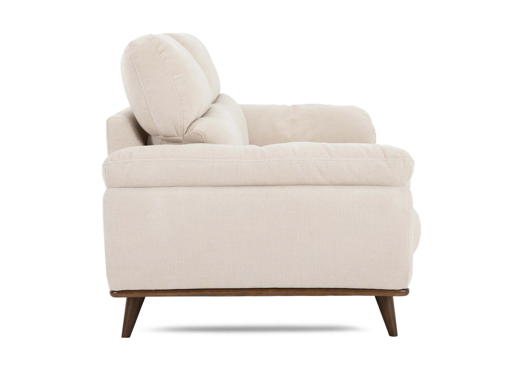 A cream 2 seater fabric sofa from EZ Livings Pippa range. Side view of wide low arms.