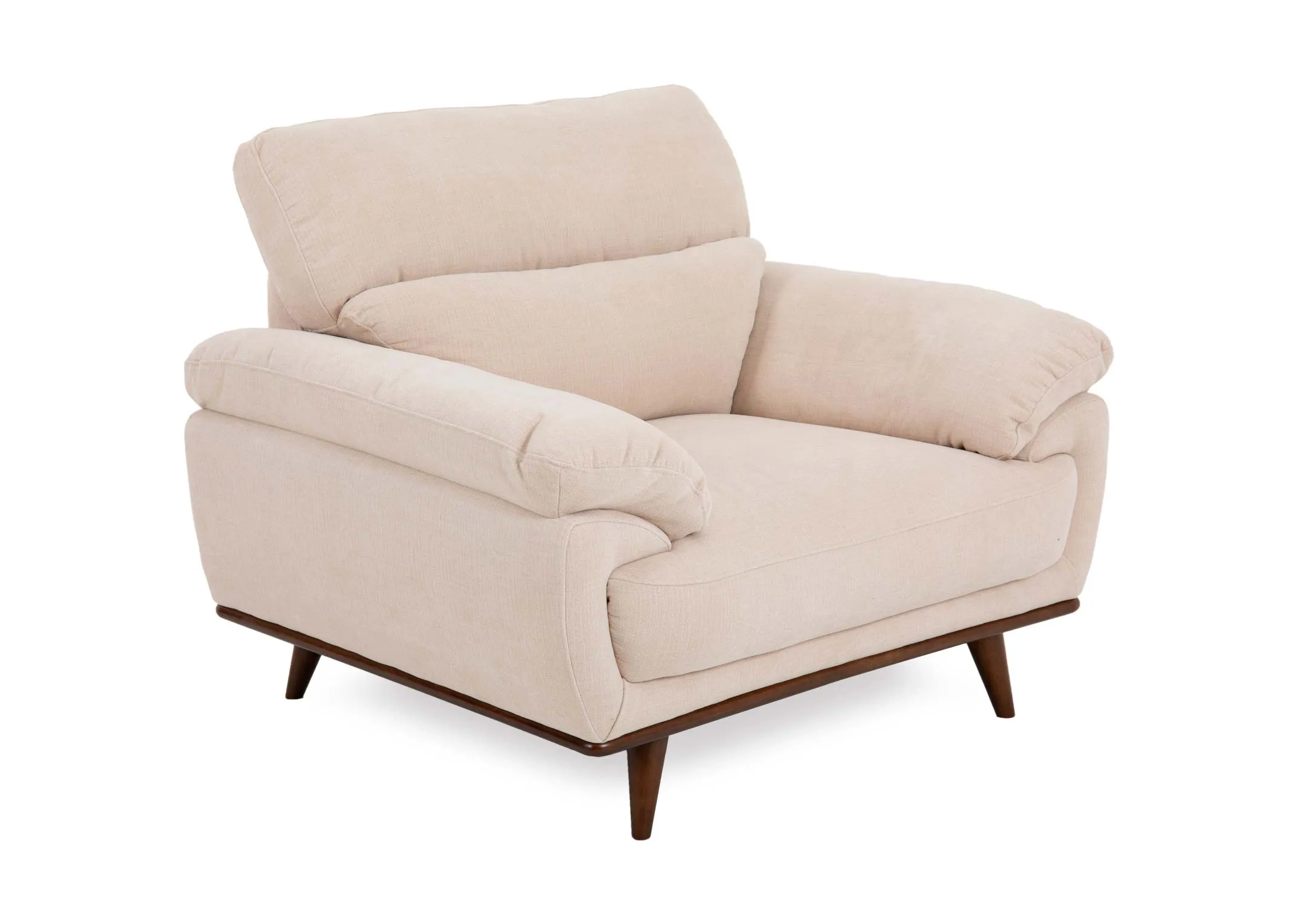 A cream fabric armchair from EZ Livings Pippa range. Angled view of walnut feet.