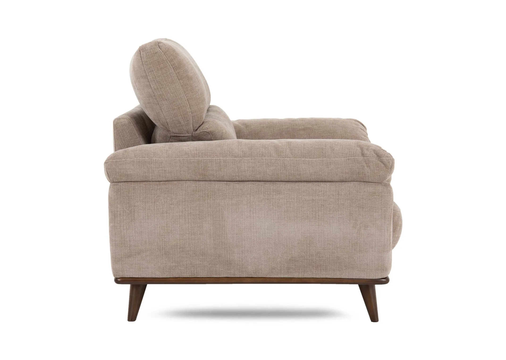 A beige fabric armchair from EZ Livings Pippa range. Side view of low wide arms