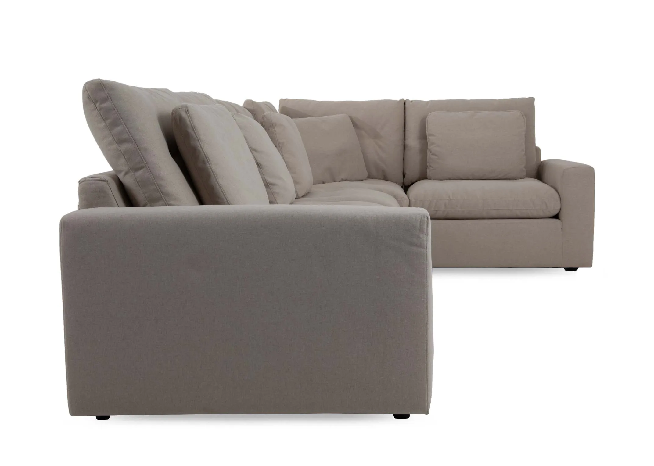 A large grey fabric laf corner group from EZ Livings Cozy range. Side view of arm
