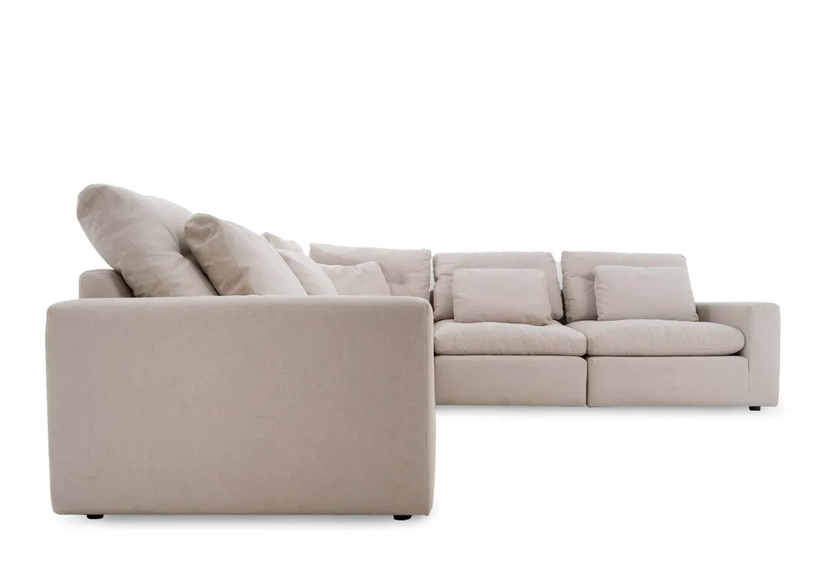 A large grey fabric laf corner group from EZ Livings Cozy range. Front view of 2 removable armless units.