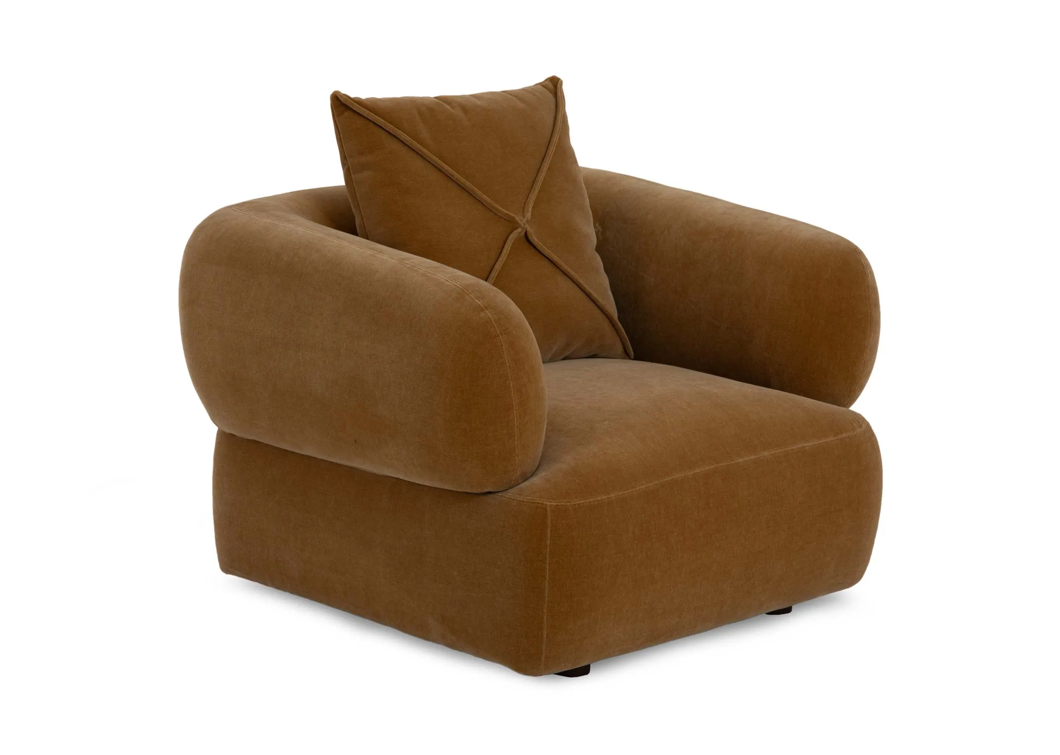 A gold velvet fabric armchair from EZ Living's Carla range. Angled view of curved arms and single large scatter cushion.