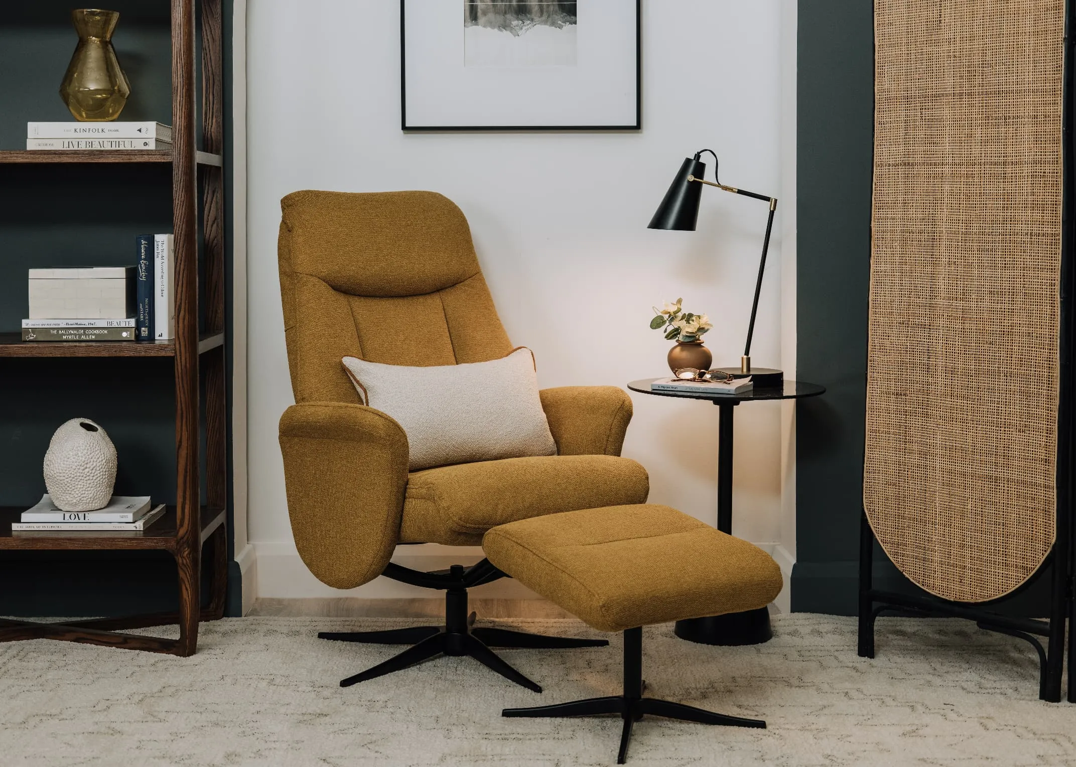 A lifestyle image of the Harry mustard recliner & ottoman with Milton bookcase and Massimo side table.