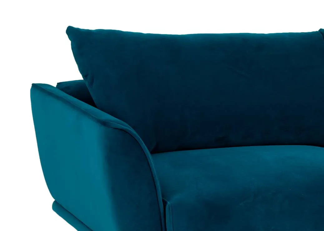 A 4 seater teal velvet sofa from EZ Livings Katie range. Closeup of teal velvet finish.