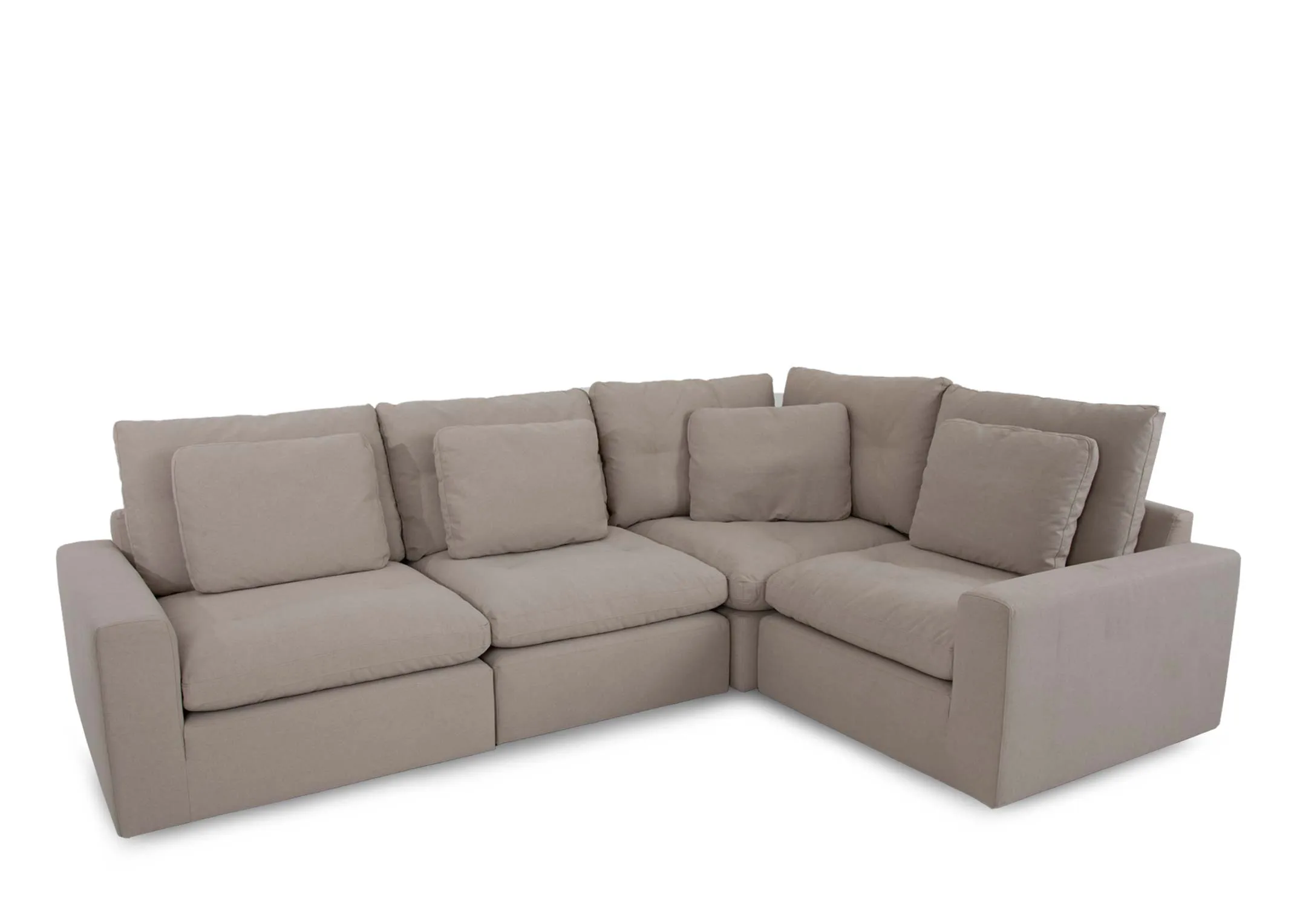 A medium light grey corner sofa from EZ Livings Cozy range. Angled view.