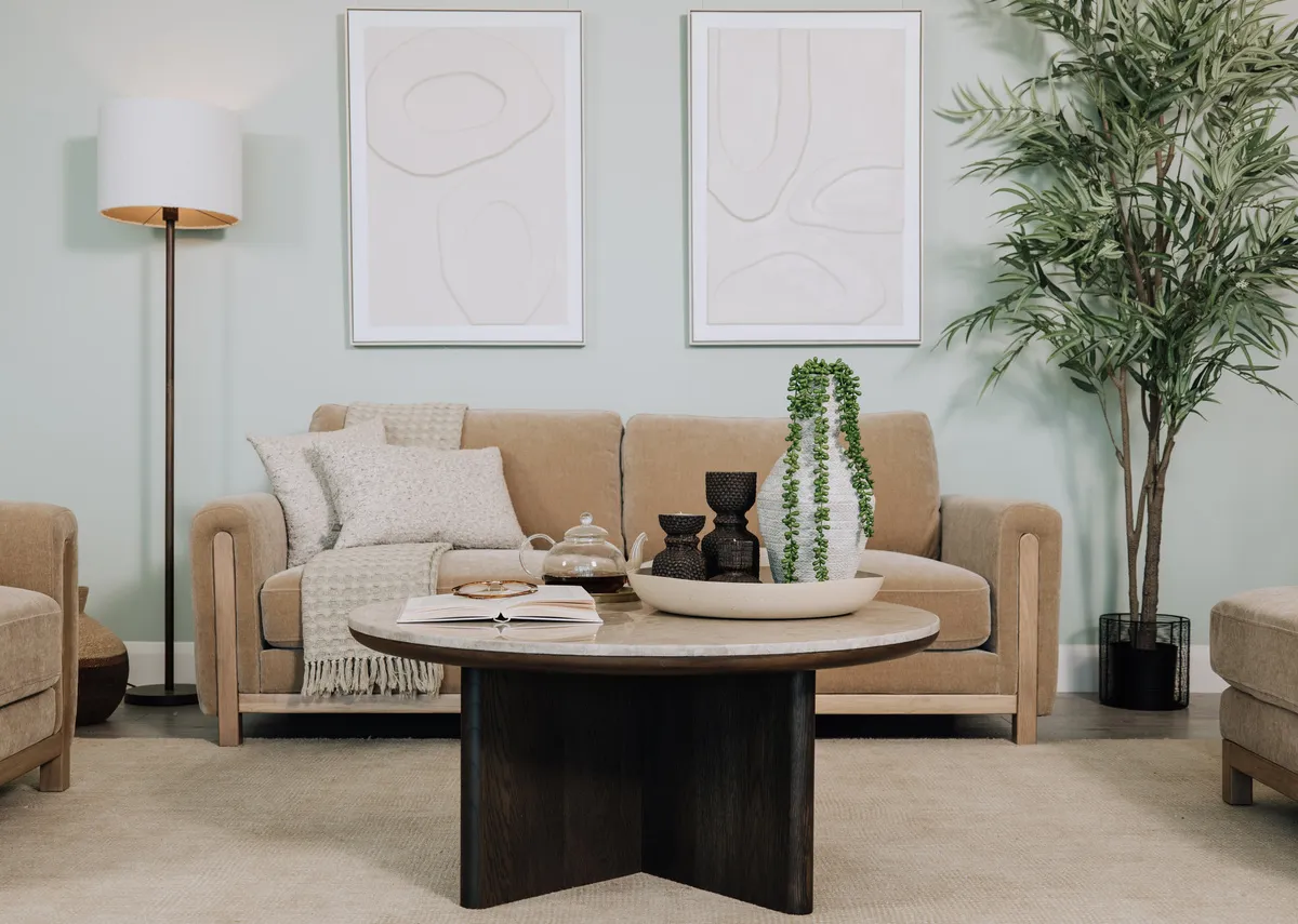 A lifestyle image of the Ritz coffee table and Miller mink sofas with Gateway canvas