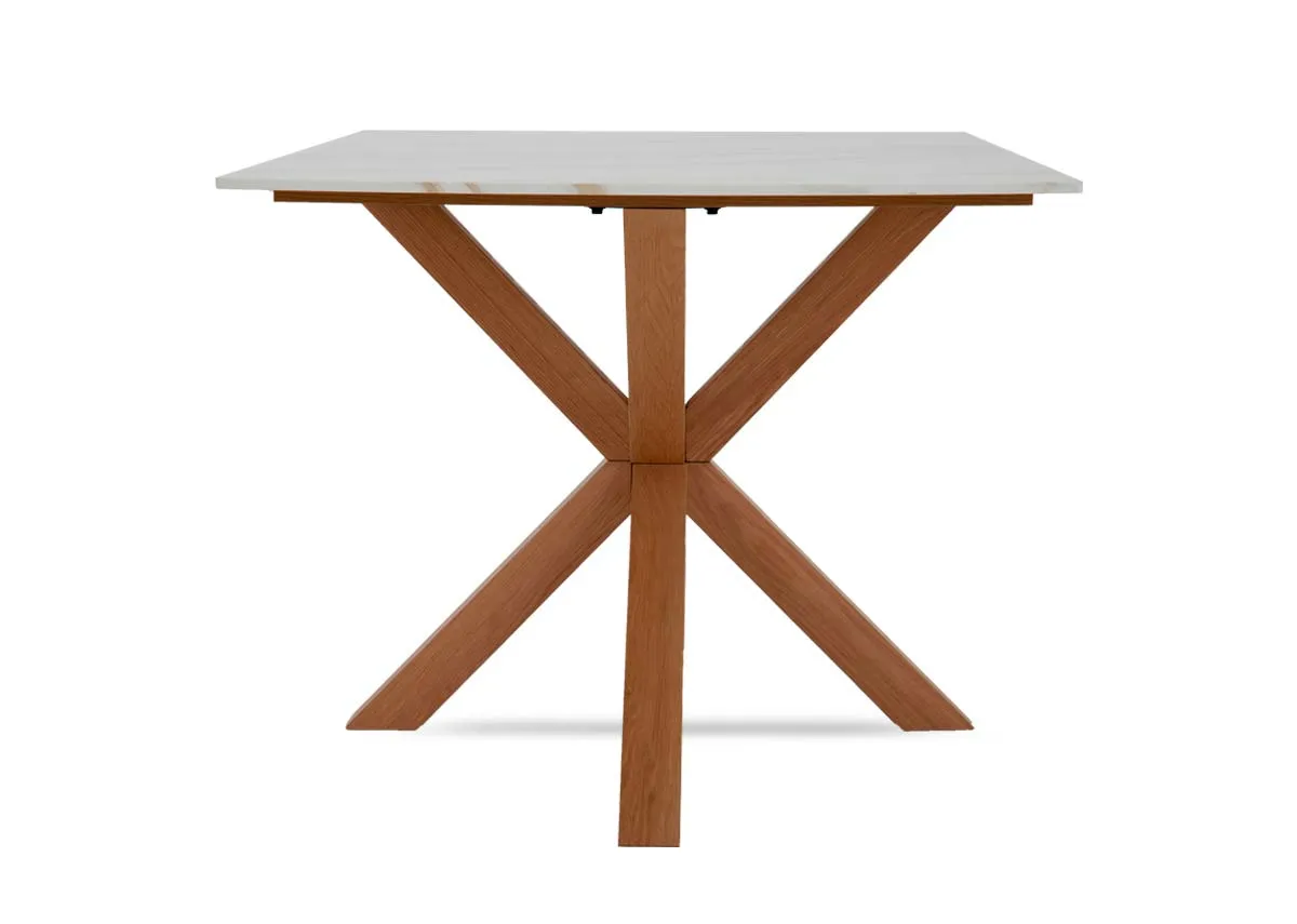 A rectangular melamine top dining tabel with oak legs from EZ Livings Ravello range.Side view of x oak legs
