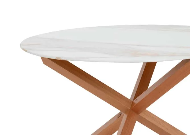 A round melamine top dining table with oak legs from EZ Livings Ravello range. Closeup of melamine marble table top.