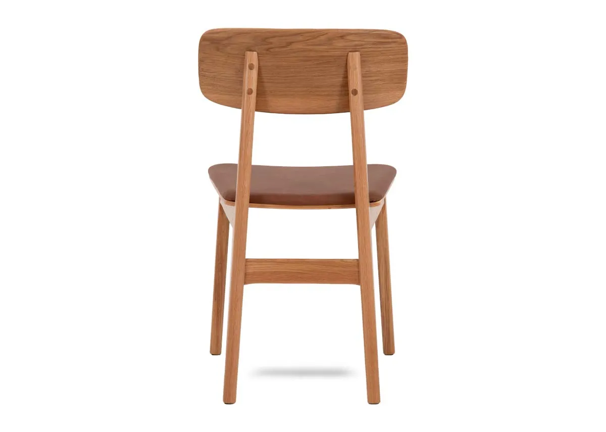 An oak framed dining chair with tan pu seat from EZ Livings Ravello range. Back view