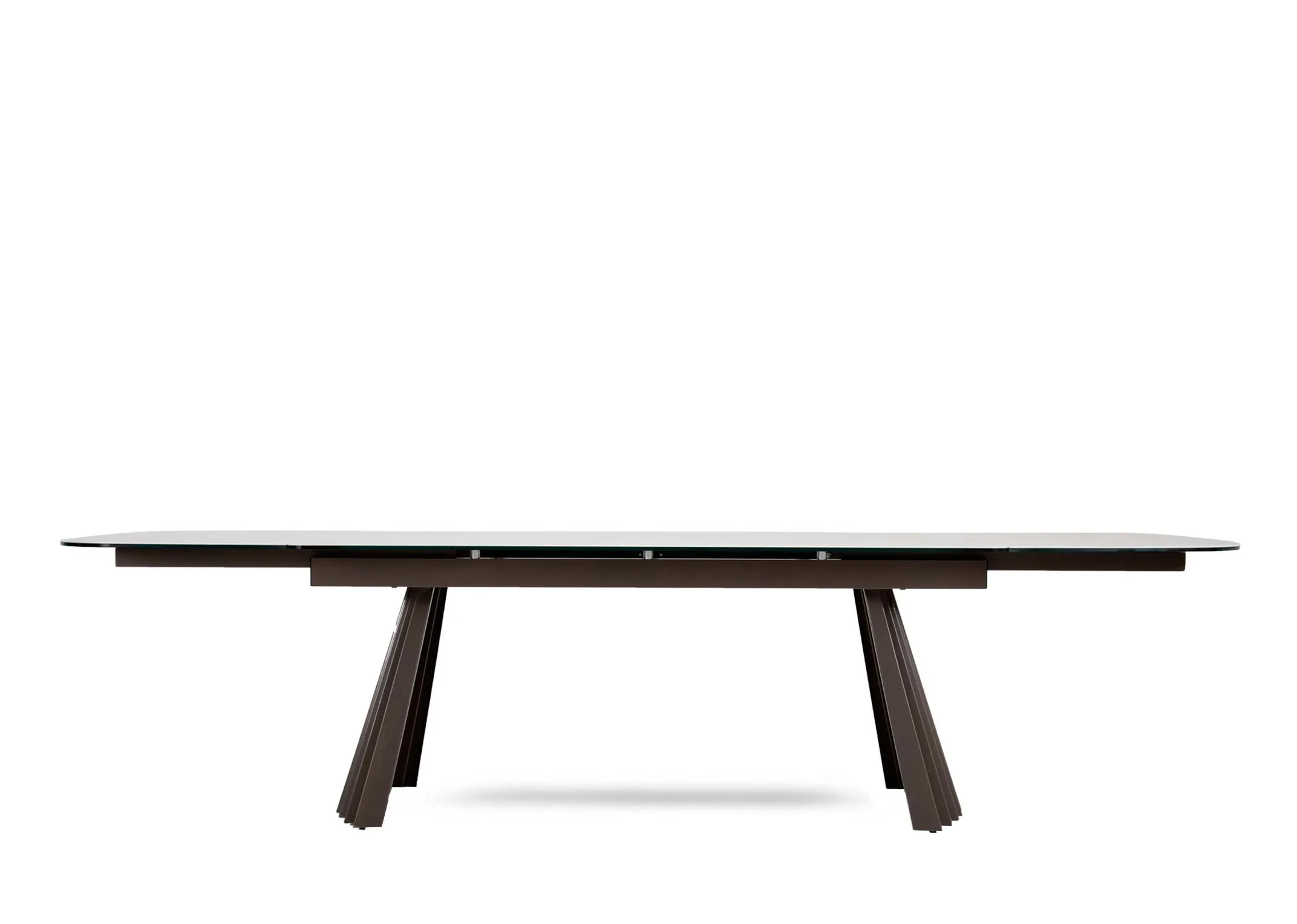 A light grey ceramic dining table with brown pleated metal legs from EZ Livings Fulton range. Front view of table with both sides extended.