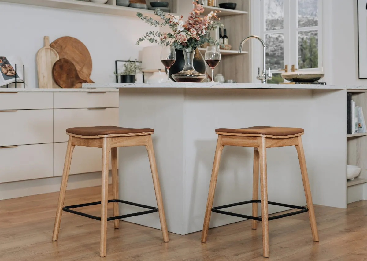 A lifestyle image of two Ravello stools at a breakfast counter