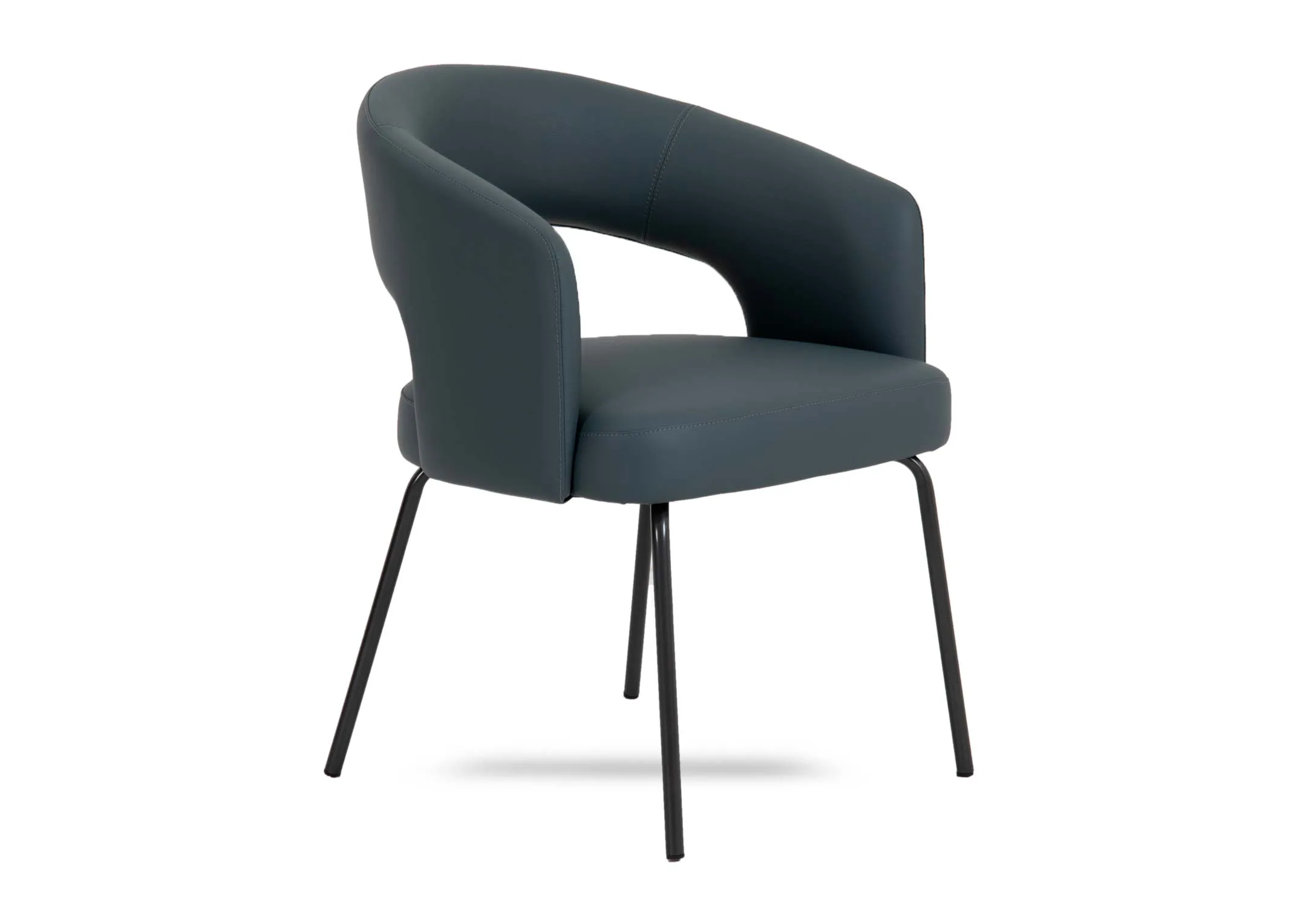 A lifestyle image of the Matteo grey faux leather dining chair with Ellie rug and lanterns.