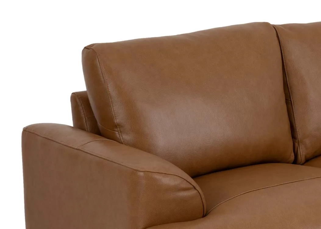 A tan brown leather 2 seater sofa from EZ Livings Legend range. Closeup of tan leather finish.