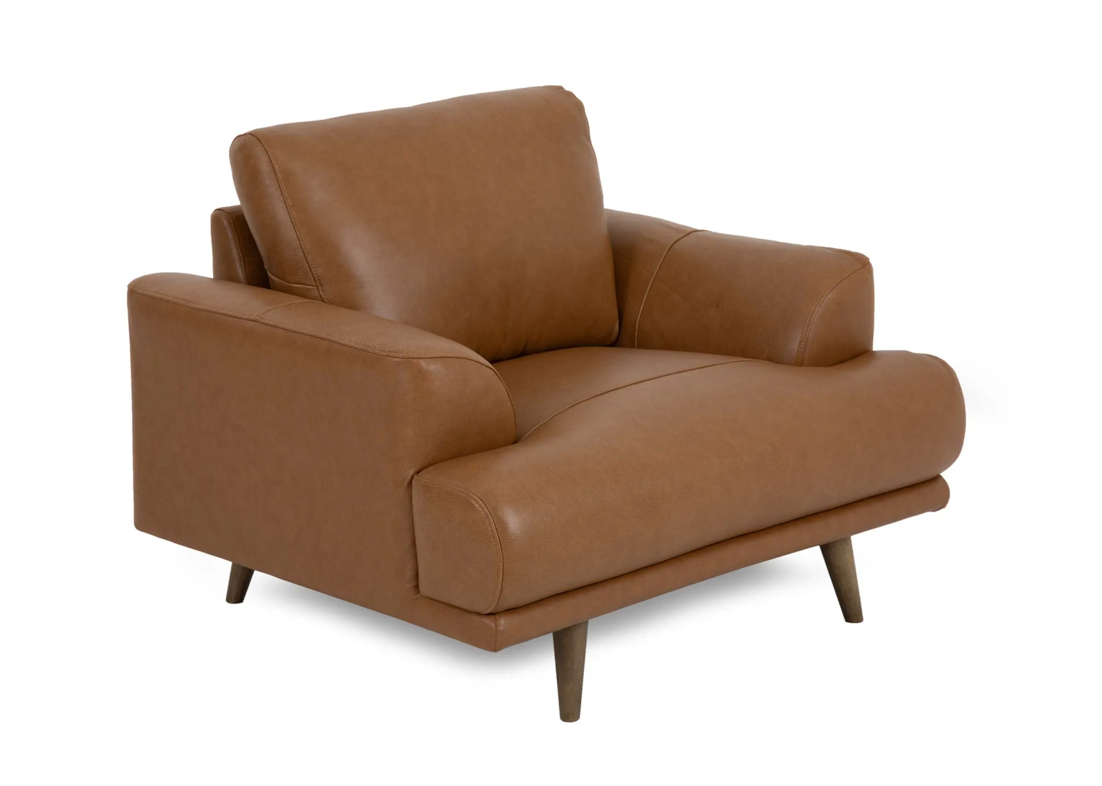 A tan brown leather armchair from EZ Livings Legend range. Angled view of wide seat and back with oak feet.