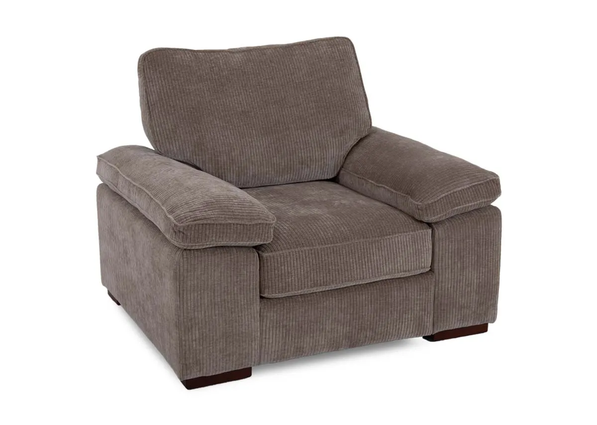 A beige cord fabric armchair from EZ Livings Westport range. Angled view.