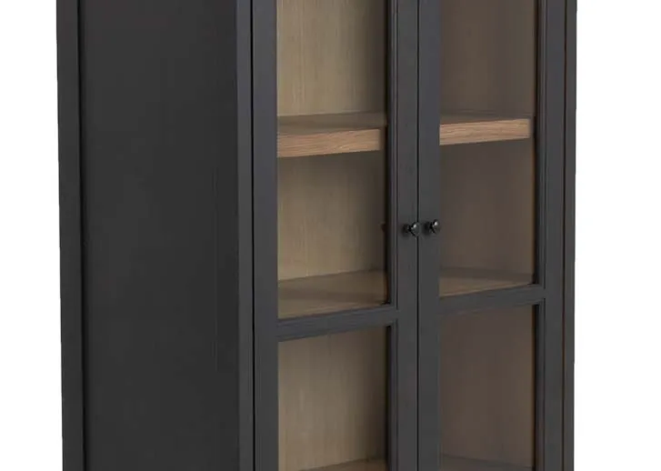 A lifestyle image of the Juliet Display Cabinet paired with the Danica armchair and Candice sofa