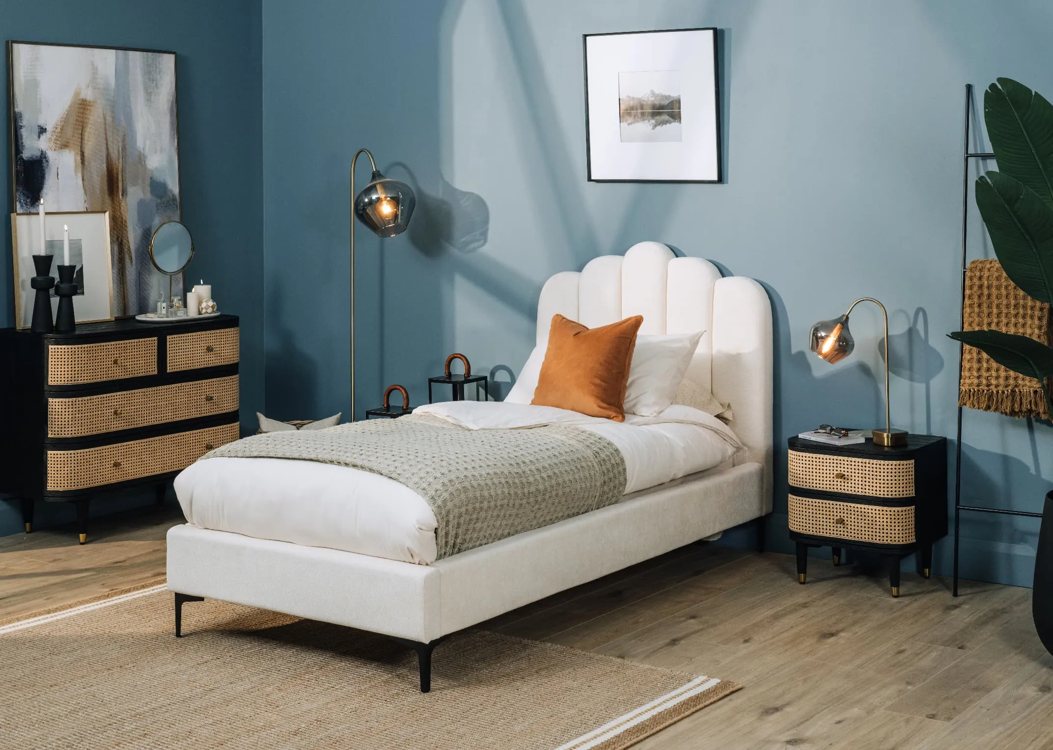A lifestyle image of the Faye bed with Lenny locker and chest with Novato rug