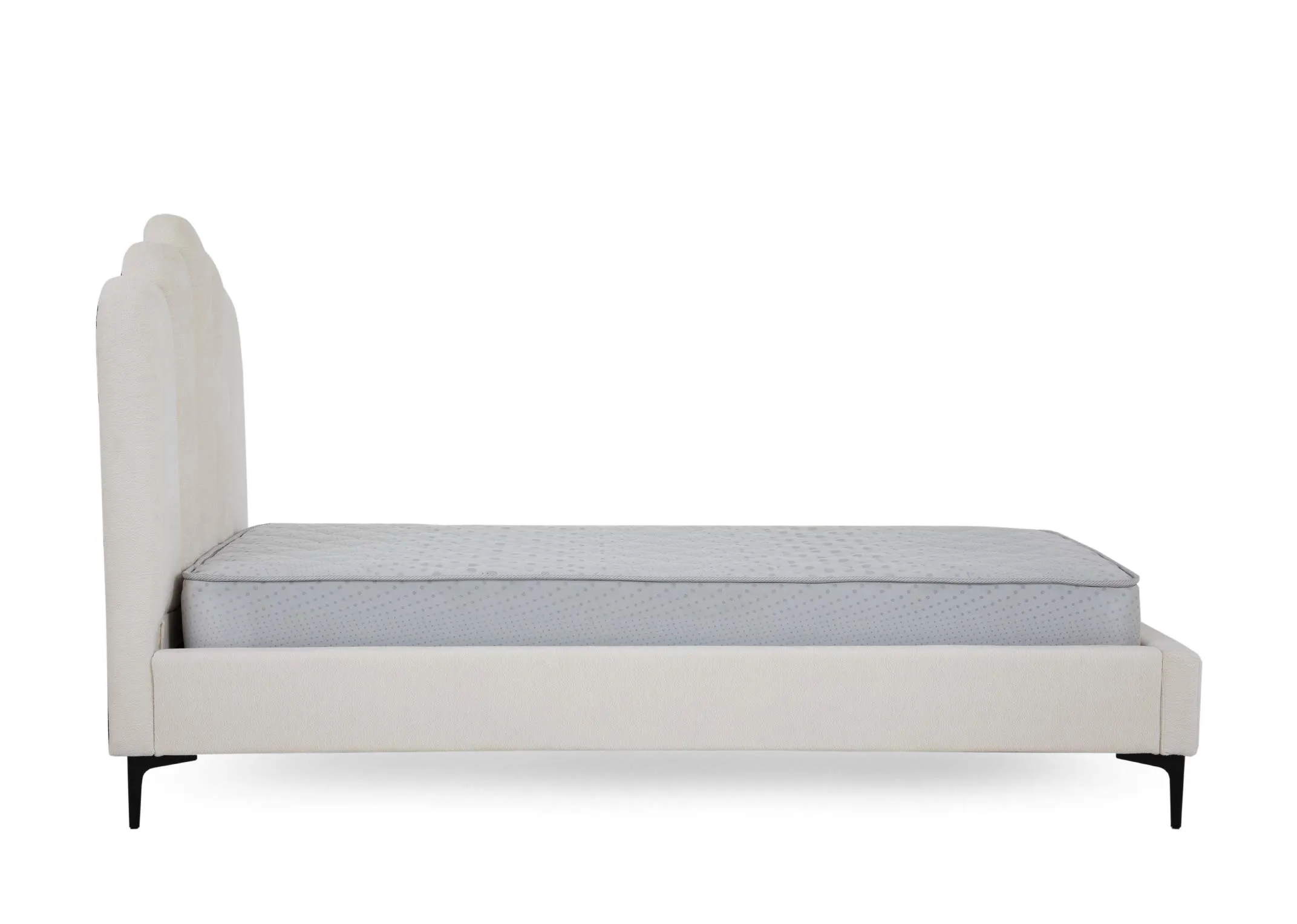 A white single bedframe with scalloped headboard from EZ Livings Faye range. Side view of black metal legs