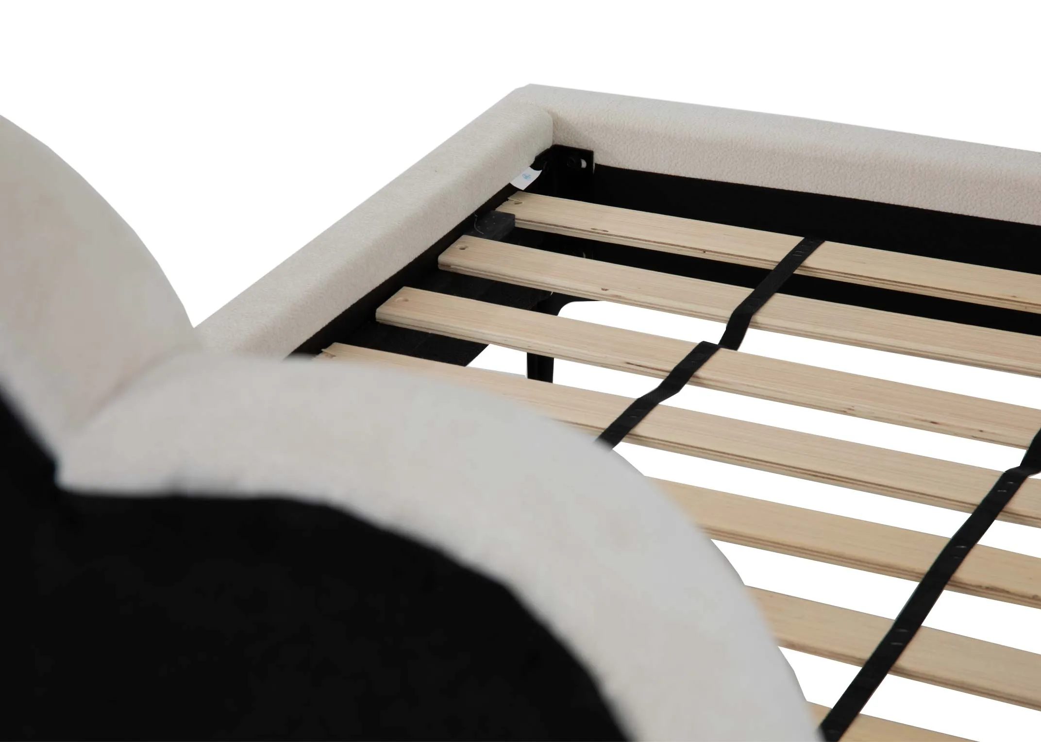 A white single bedframe with scalloped headboard from EZ Livings Faye range. Closeup of slat base