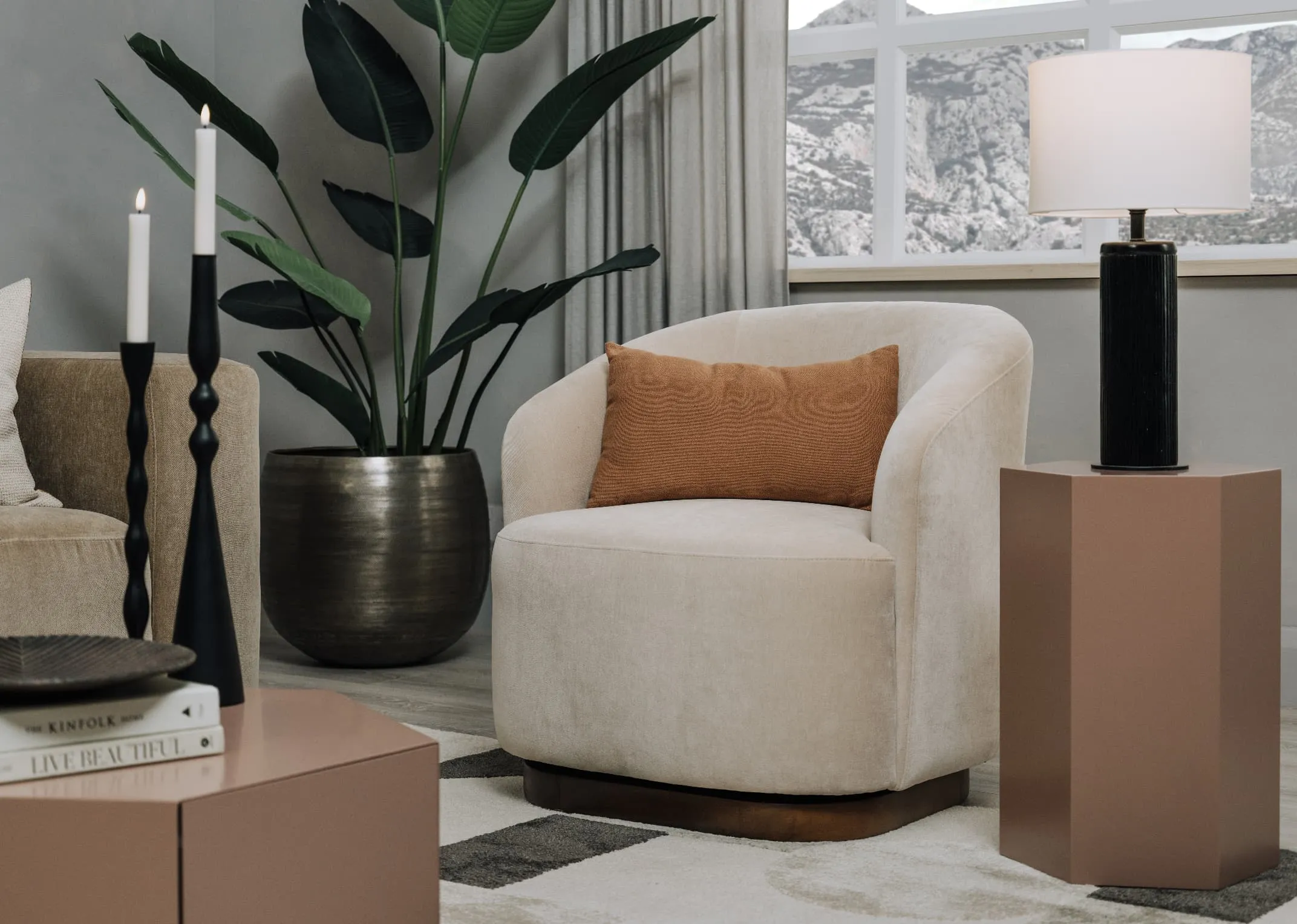 A lifestyle image of the Derby Sand swivel chair with Jonas side and coffee table and black mistry candleholders