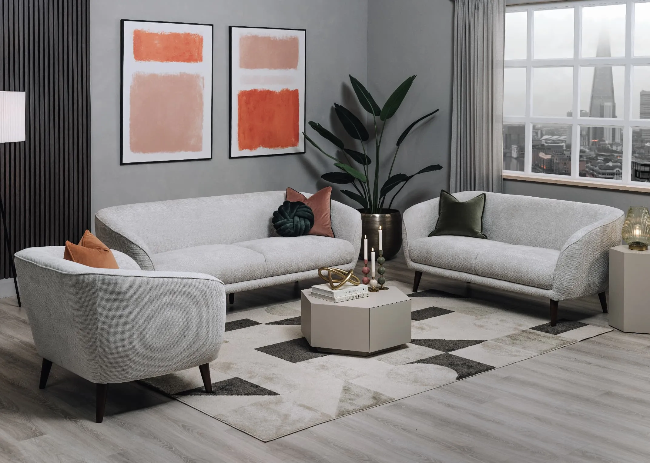 A lifestyle image of the Amber sofa range with Jonas coffee table and side table.