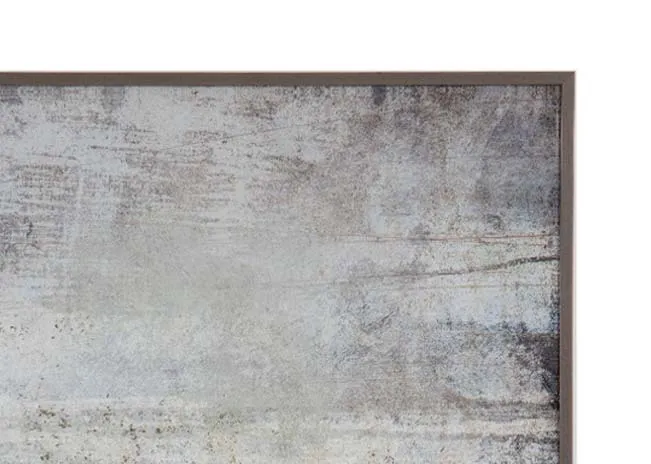 A gold foil canvas of a moody landscape from EZ Livings Torrent range. Closeup of gold frame