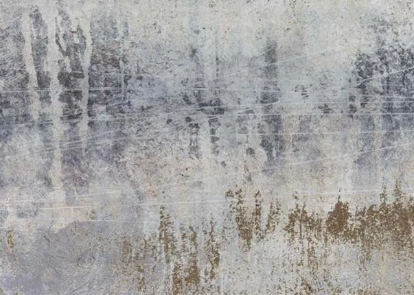 A gold foil canvas of a moody landscape from EZ Livings Torrent range.Closeup of gold and blue and grey colors