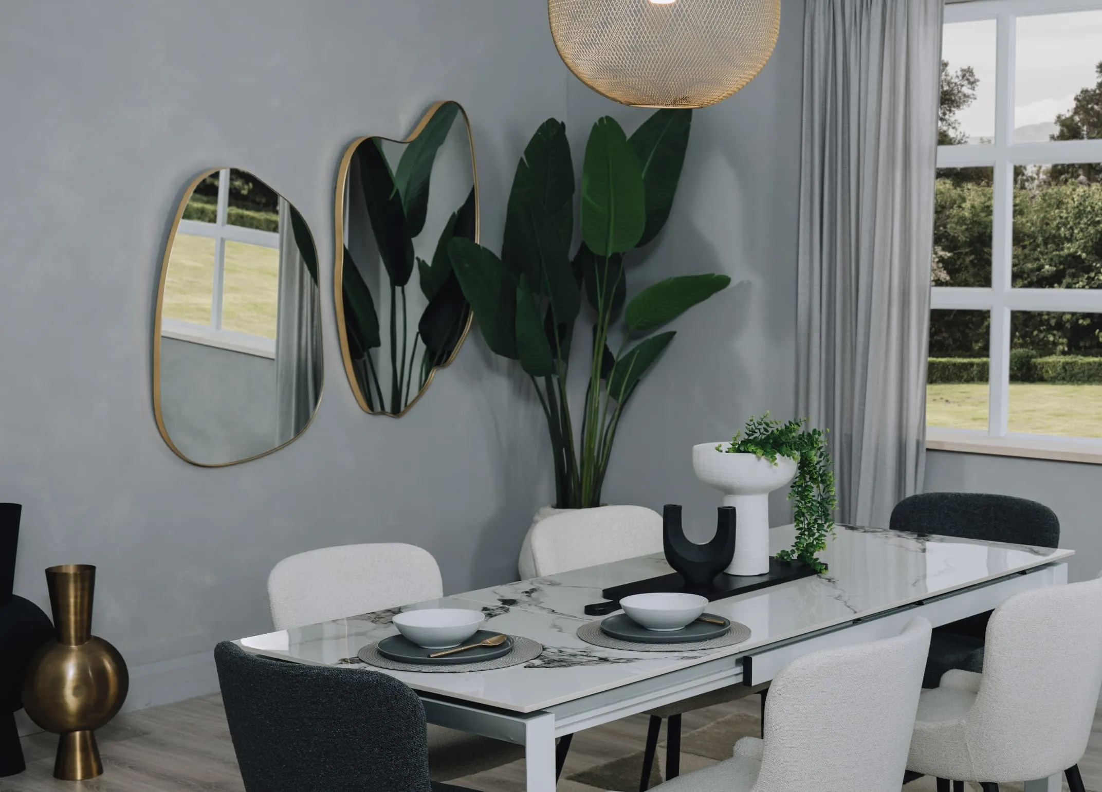 A lifetsyle image of the Samara white table and Colson mirror