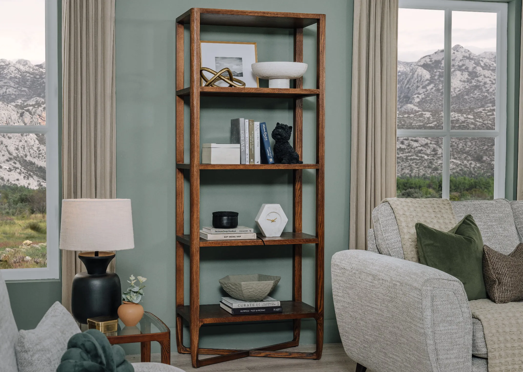 A lifestyle image of the Cameo shelving unit with accessories from EZ Living Furniture.