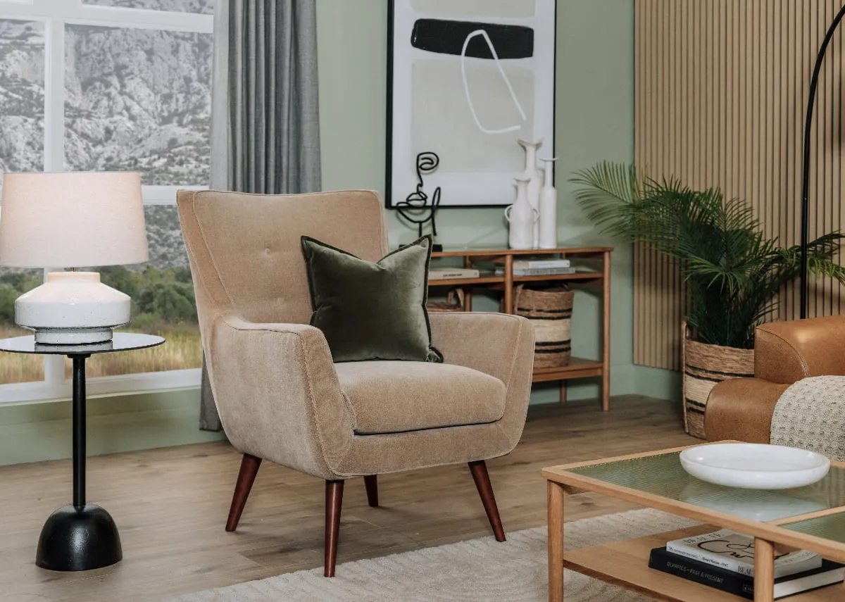 A lifetsyle image of the Stratus chair with Feale Lamp on a Massimo side table