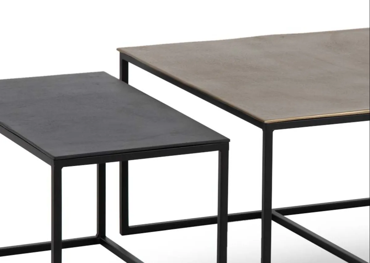 A nest of 3 rectangular coffee tables from EZ Livings Joyo range.Closeup of metallic finish