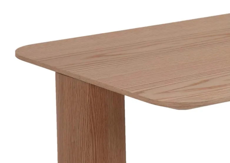 A rectangular oak veneer coffee table with 4 chunky legs from EZ Livings Kasper range. Closeup of oak finish