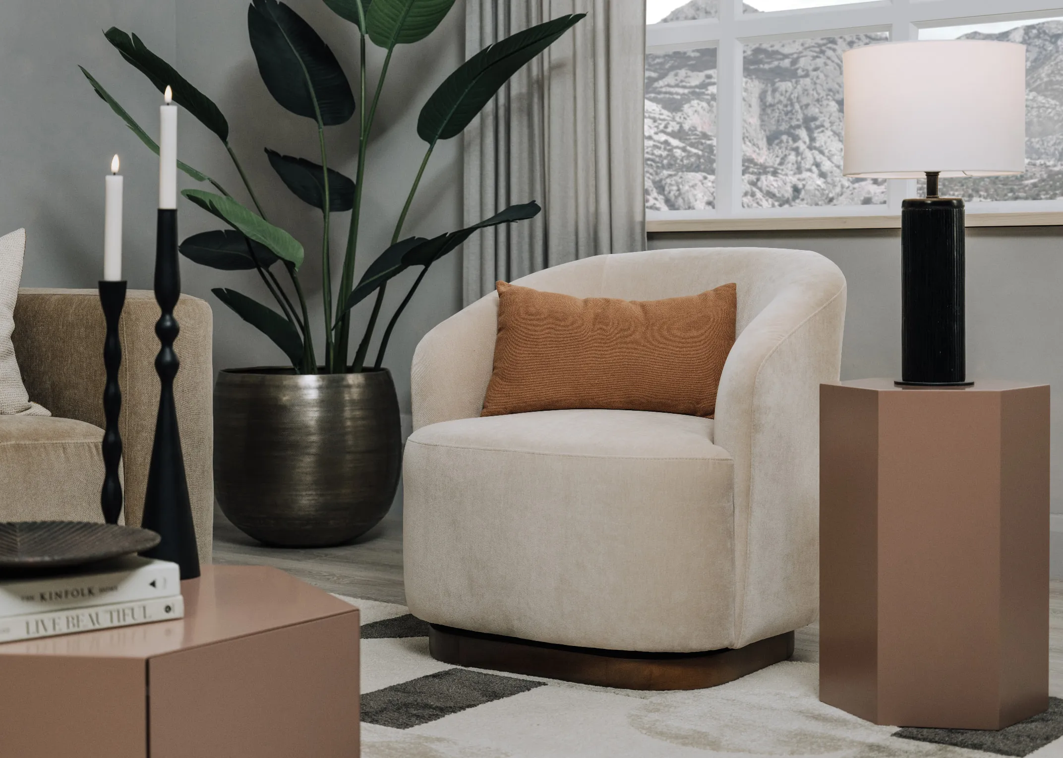 A lifestyle image of the Derby cream armchair with Jonas brown lamp table with Lomas lamp.