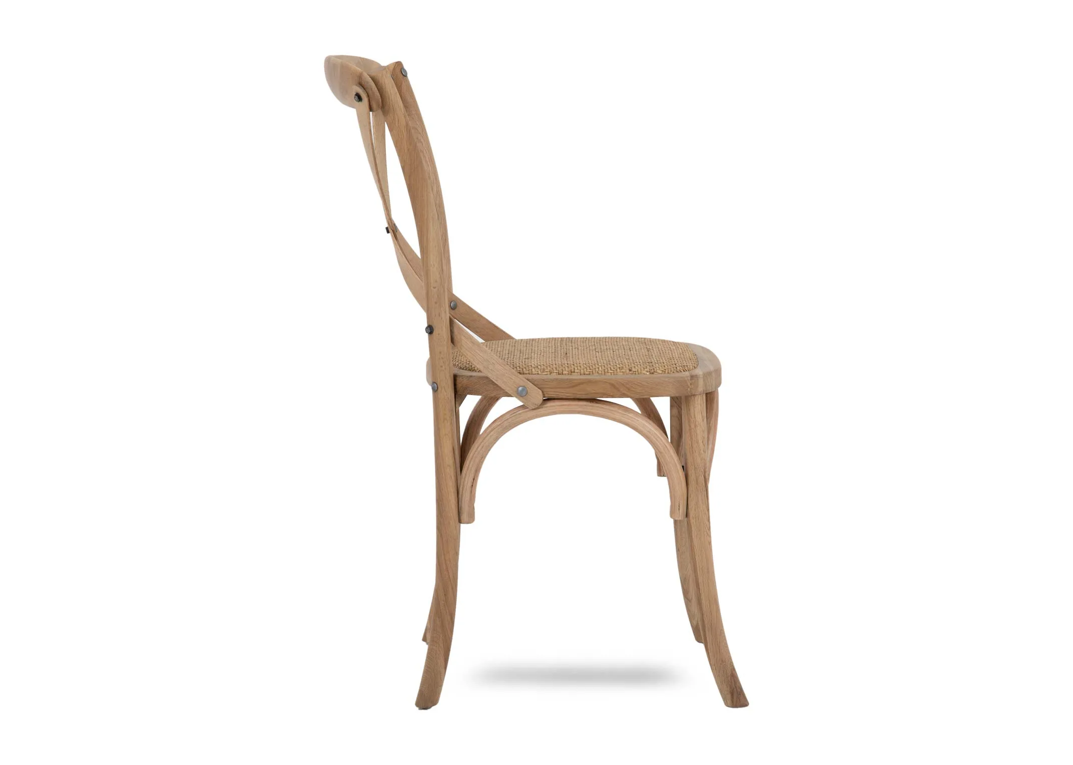 A weathered oak dining chair with x back seat from EZ Livings Tavern range. Side view of angled feet.