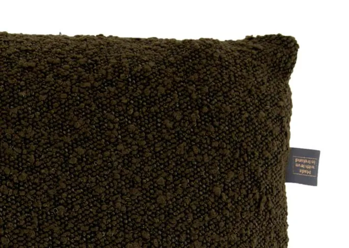 A dark green boucle cushion from EZ Livings Benbulbin range.
