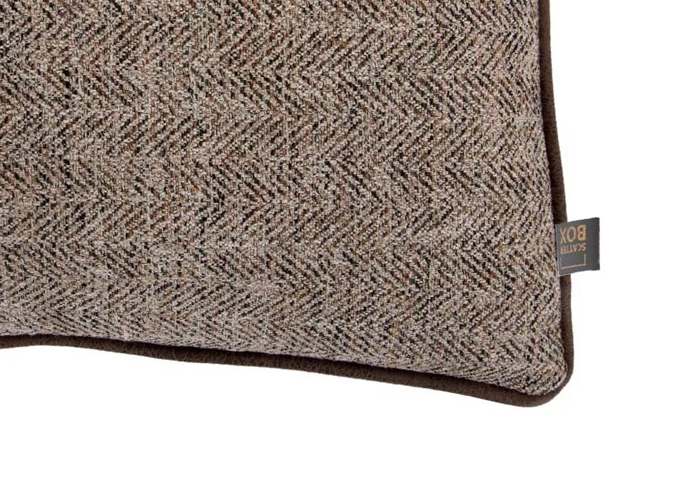 A brown tweed cushion from EZ Livings Inishmurray range. Closeup of tweed texture