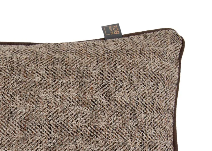 A brown tweed cushion from EZ Livings Inishmurray range.. Closeup of brown & white pattern.
