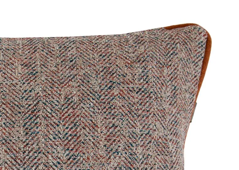 A copper velvet trim on an accent fabric cushion from EZ Livings Strandhill rangeCloseup of black and copper tones in fabric