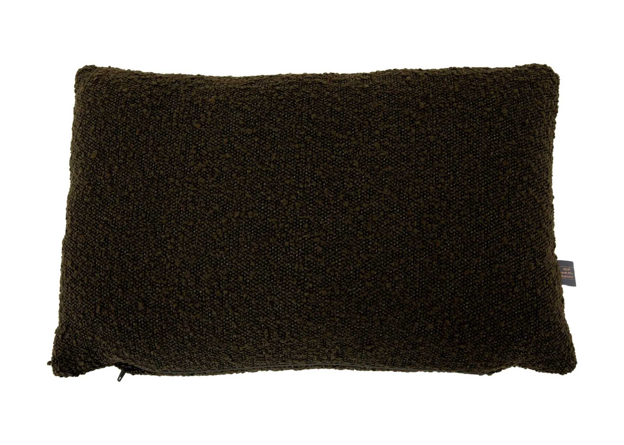 A dark green boucle bolster cushion from EZ Livings Benbulbin range. Front view.