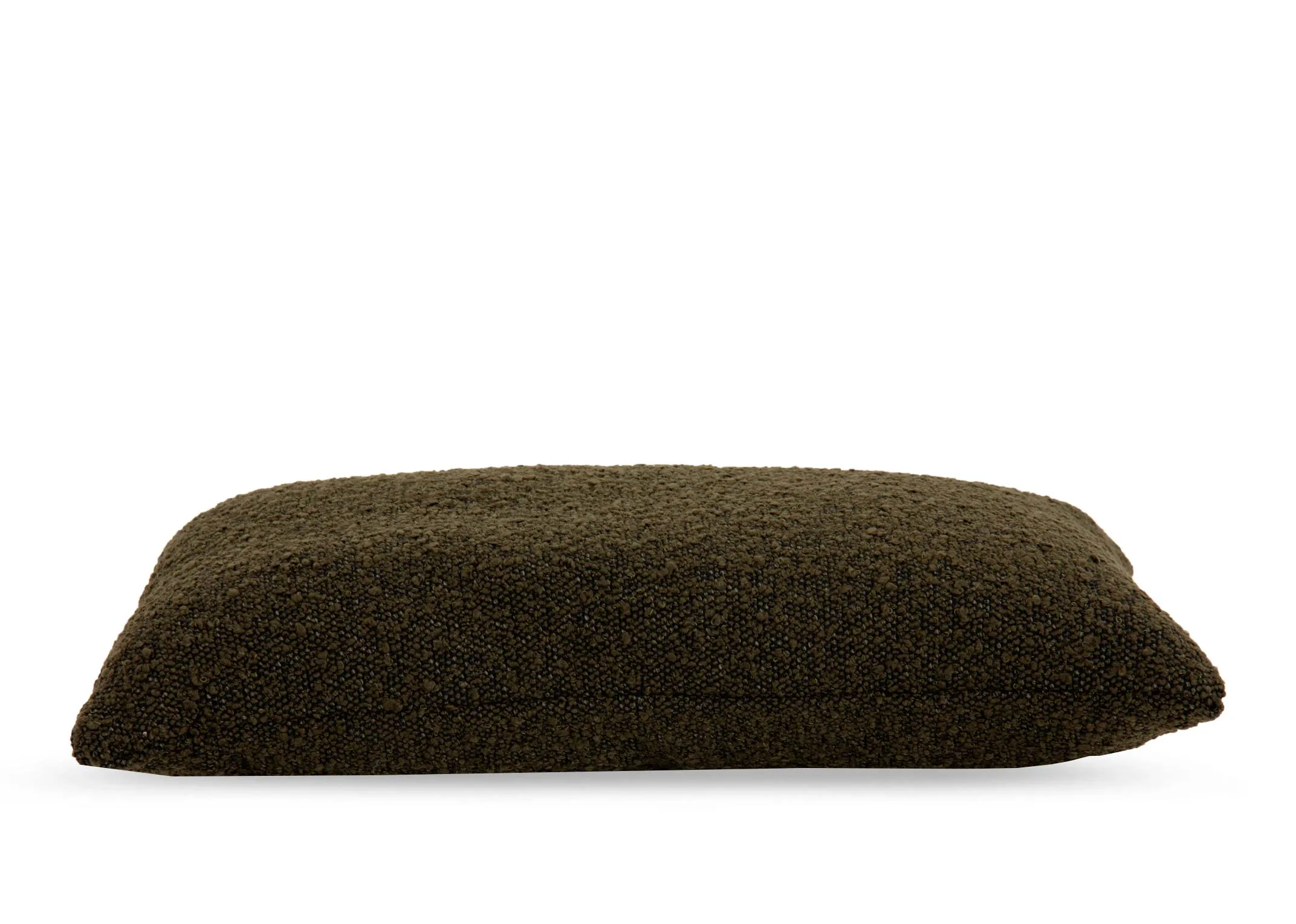 A dark green boucle bolster cushion from EZ Livings Benbulbin range.Side view