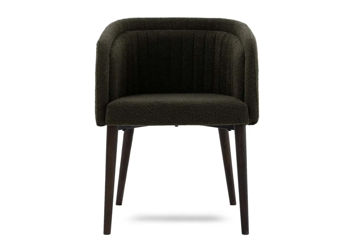 A green boucle dining chair from EZ Livings Bardot range. Front view of the stitch detail on the double layer backrest.