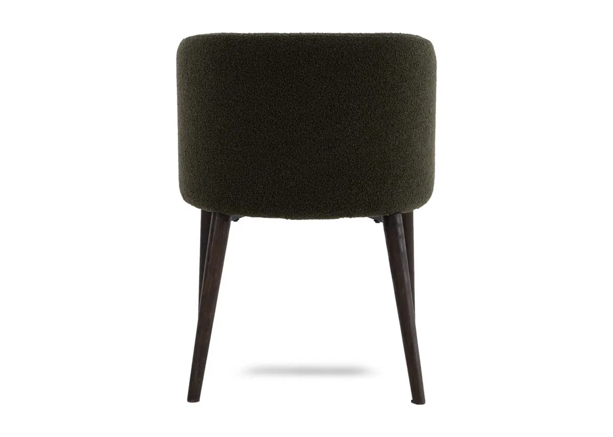 A green boucle dining chair from EZ Livings Bardot range. Back view of curved back