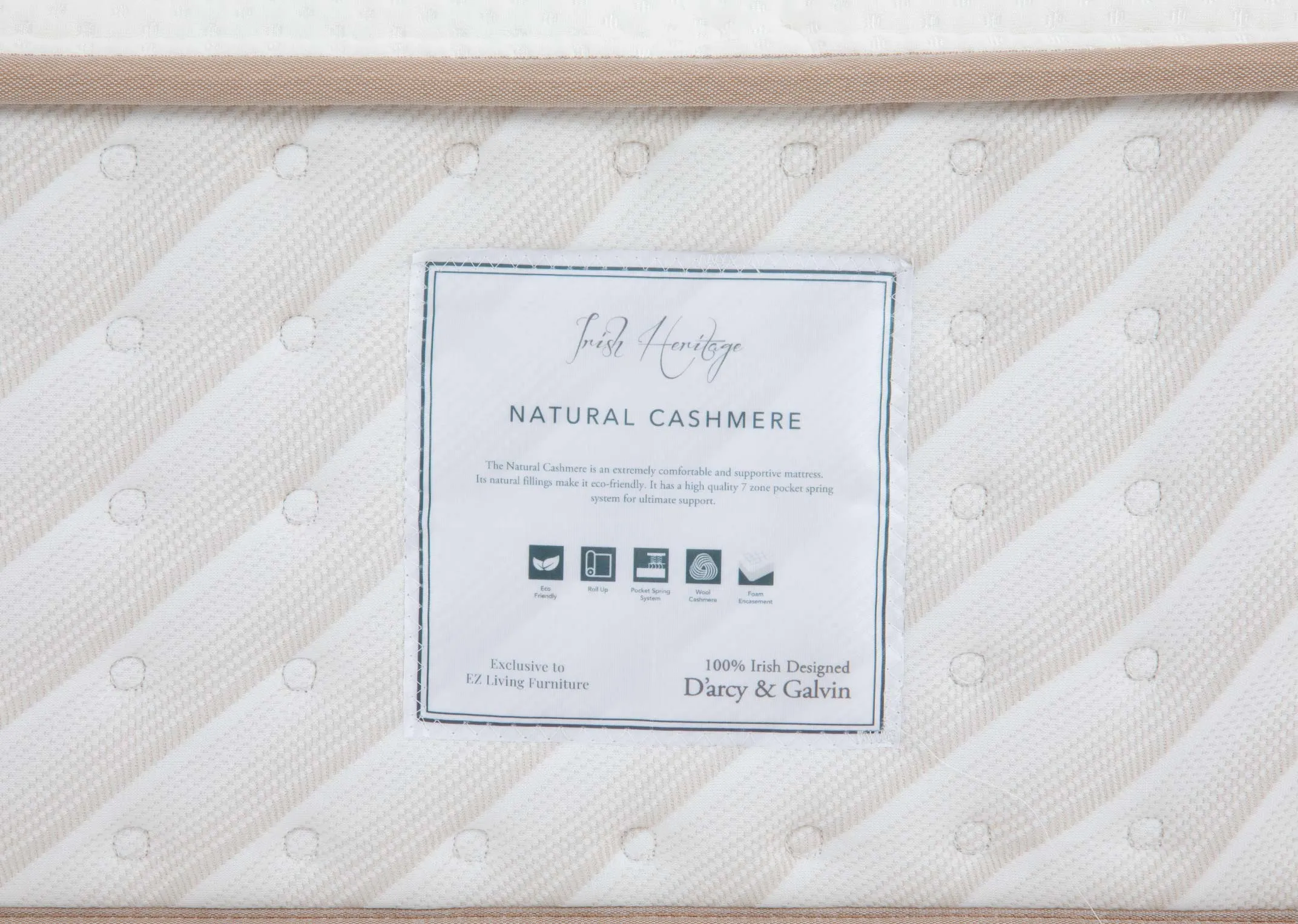 A 1500 pocket spring mattress from EZ Livings Natural Cashmere range. Closeup of branding shows detail on spring support and eco friendly.