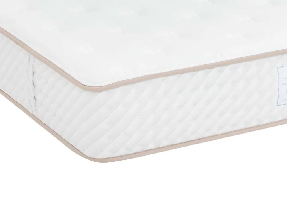 A 1500 pocket spring mattress from EZ Livings Natural Cashmere range. Closeup of the beige trim on mattress