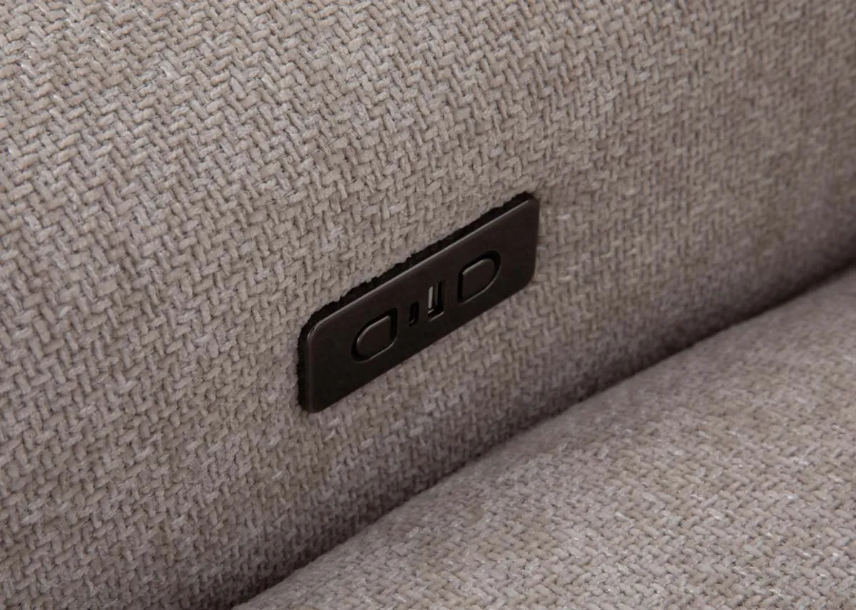 A beige fabric large corner sofa from EZ Livings Ashbrook range. Closeup of power reclining button