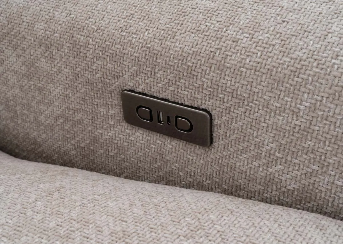 A 2 seater beige fabric power recliner from EZ Livings Ashbrook range.Closeup of power reclining button
