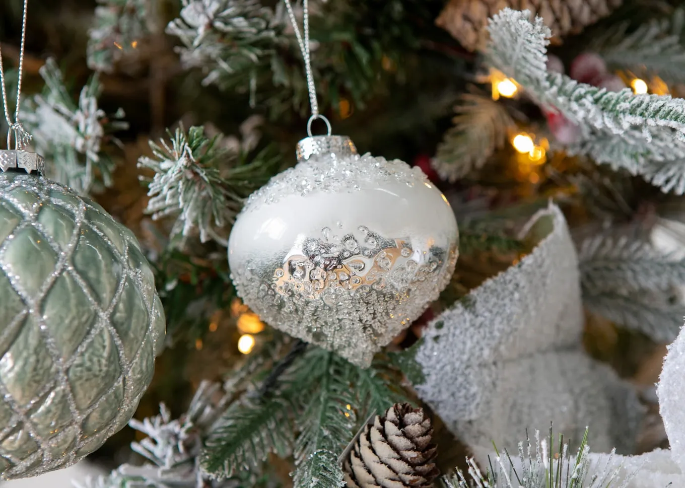 A lifestyle image of the White Christmas Bauble with 8cm