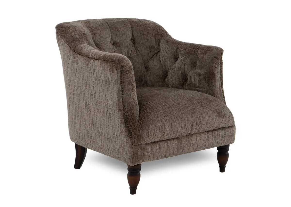 A taupe velvet fabric occasional chair from EZ Livings Carter range. Angled view.